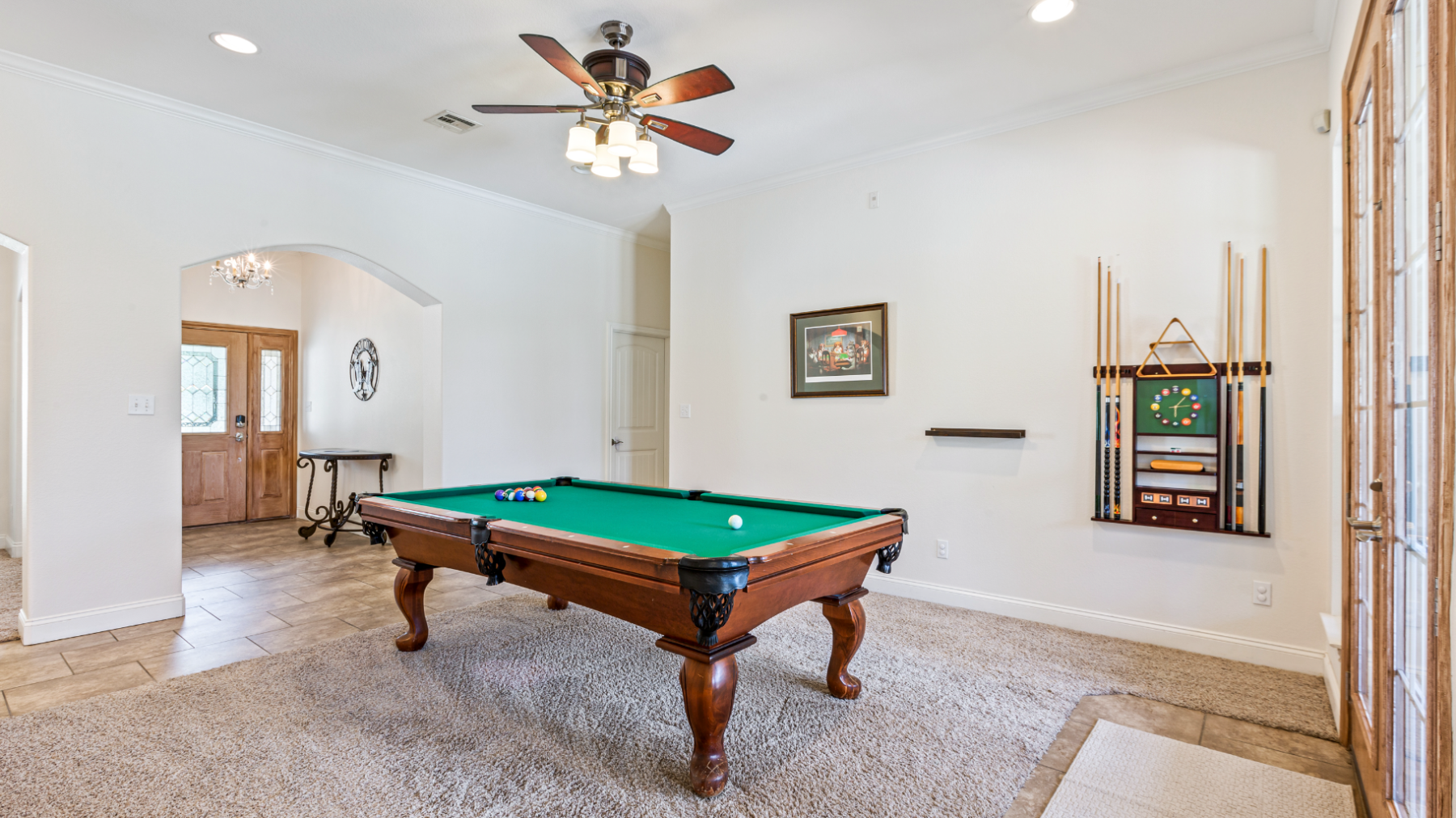 a living room filled with furniture and a rug